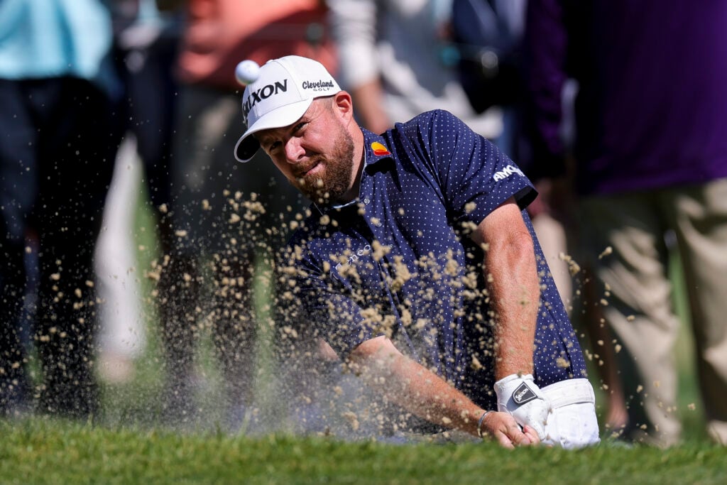 Shane Lowry plays a bunker shot at the Truist Championship 2025