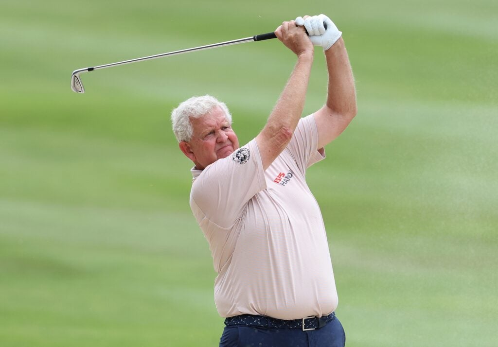 Colin Montgomerie plays an iron shot at the Senior Open 2025