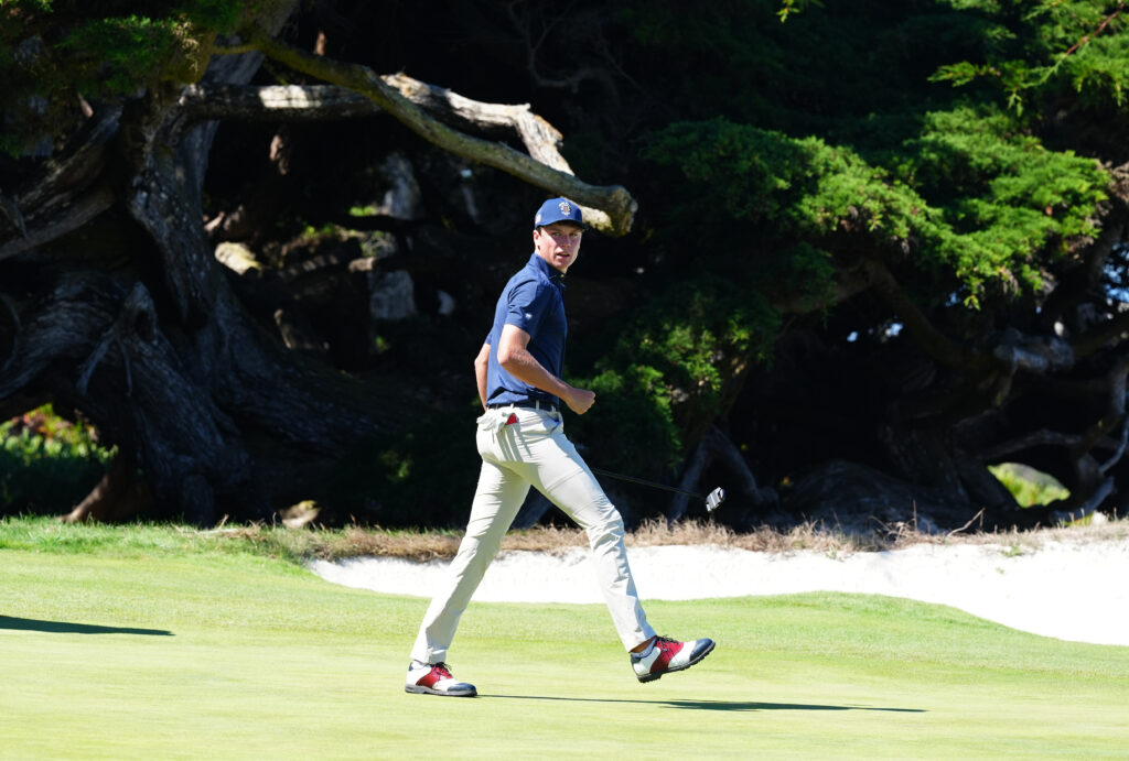 Mason Howell celebrates making a birdie during the 2025 Walker Cup