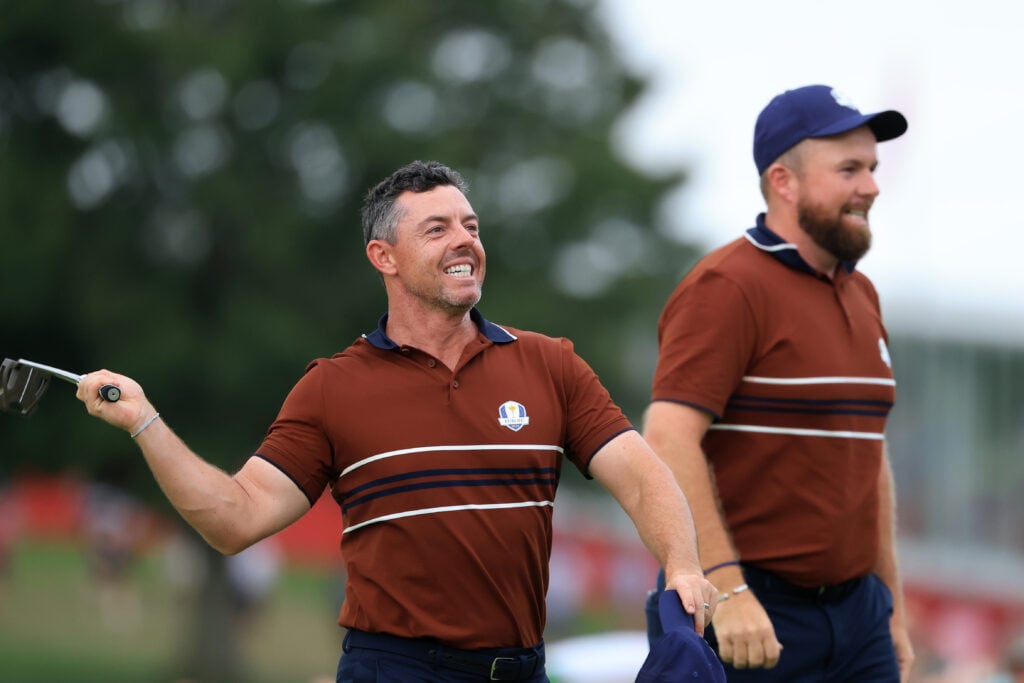 Rory McIlroy and Shane Lowry celebrate winning their match during the Saturday afternoon four-balls at the Ryder Cup at Bethpage Black