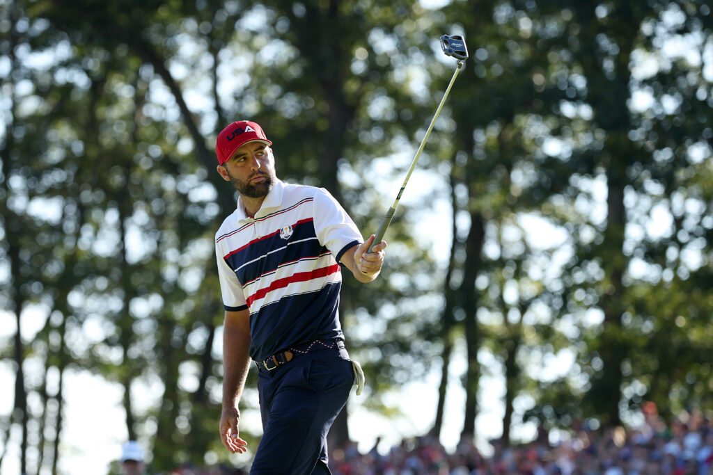 Scottie Scheffler acknowledges the crowd during his match with Rory McIlroy at the Ryder Cup