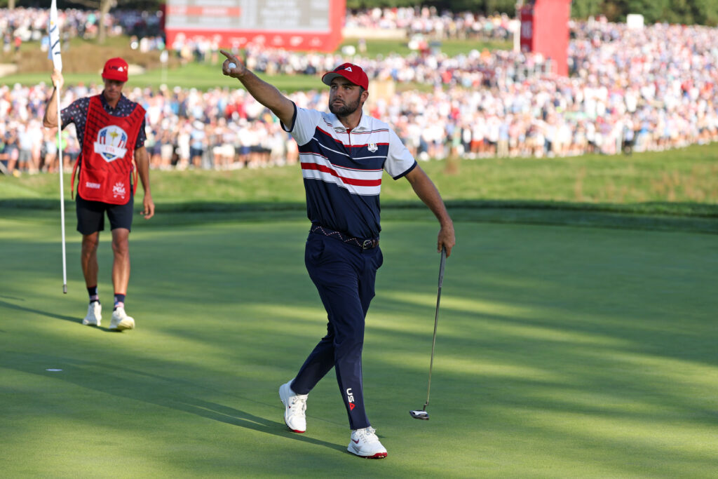 Scottie Scheffler celebrates a putt during the singles at the 2025 Ryder Cup