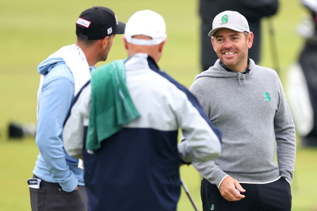 Louis Oostuizen speaks to his caddy during round two of the Alfred Dunhill Links Championship