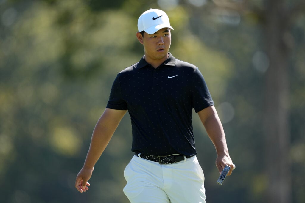 Tom Kim walks to the green during round one of the Sanderson Farms Championship