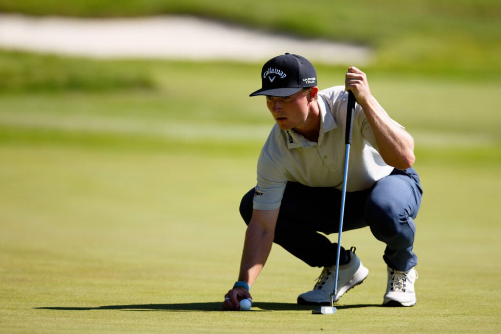 Blades Brown lines up a putt during the third round of the Compliance Solutions Championship