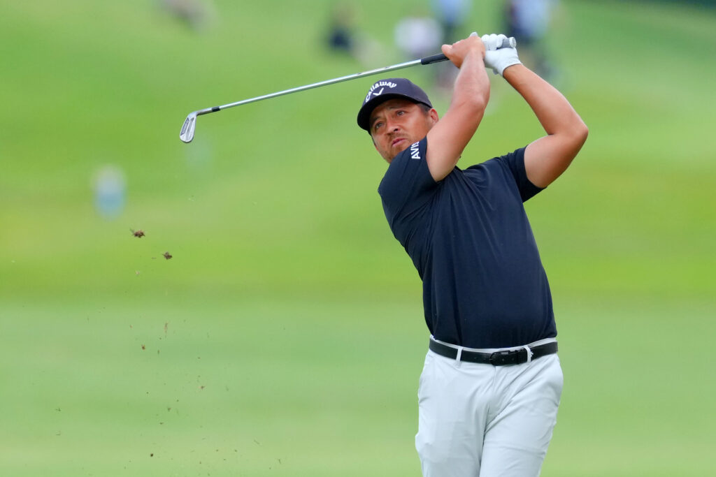 Xander Schauffele hits his second shot on the 18th hole during the second round of the Baycurrent Classic at Yokohama Country Club
