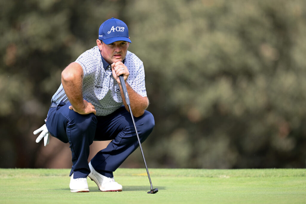 Patrick Reed lines up a putt during round two of the Spanish Open 2025