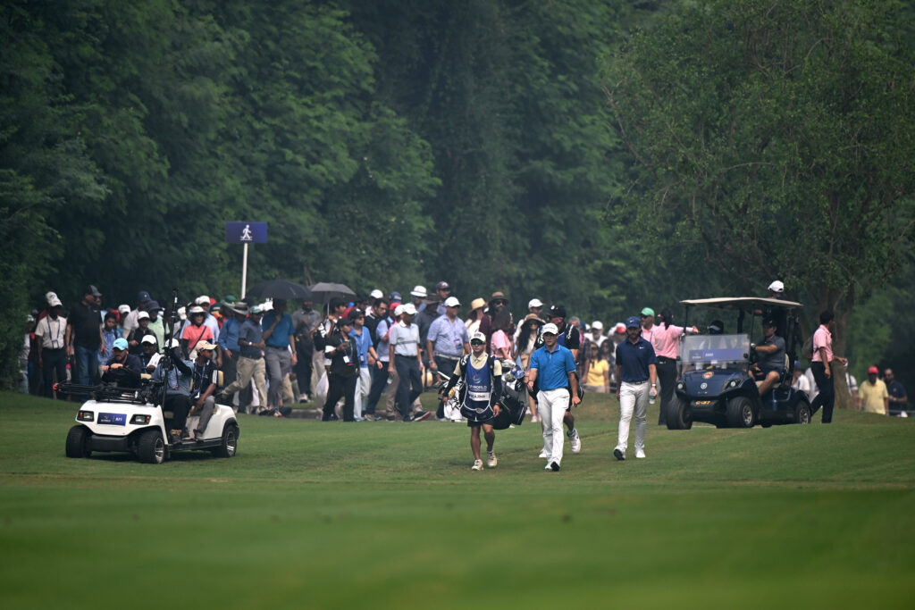 Keita Nakajima and Tommy Fleetwood on the 3rd hole on day four of the DP World India Championship at Delhi Golf Club