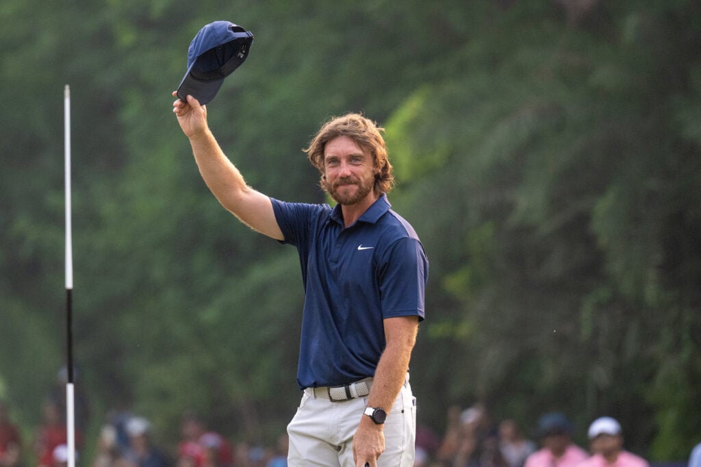 Tommy Fleetwood of England celebrates after winning the DP World India Championship 2025