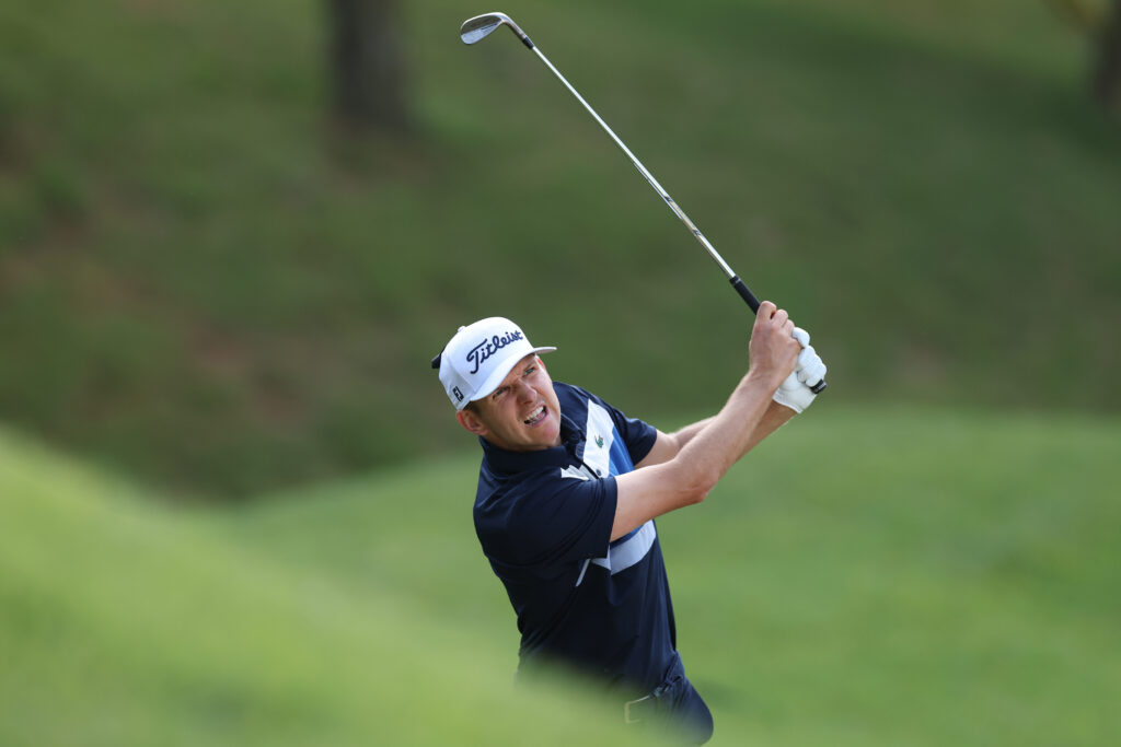 Yannik Paul hits an iron shot during round one of the Genesis Championship