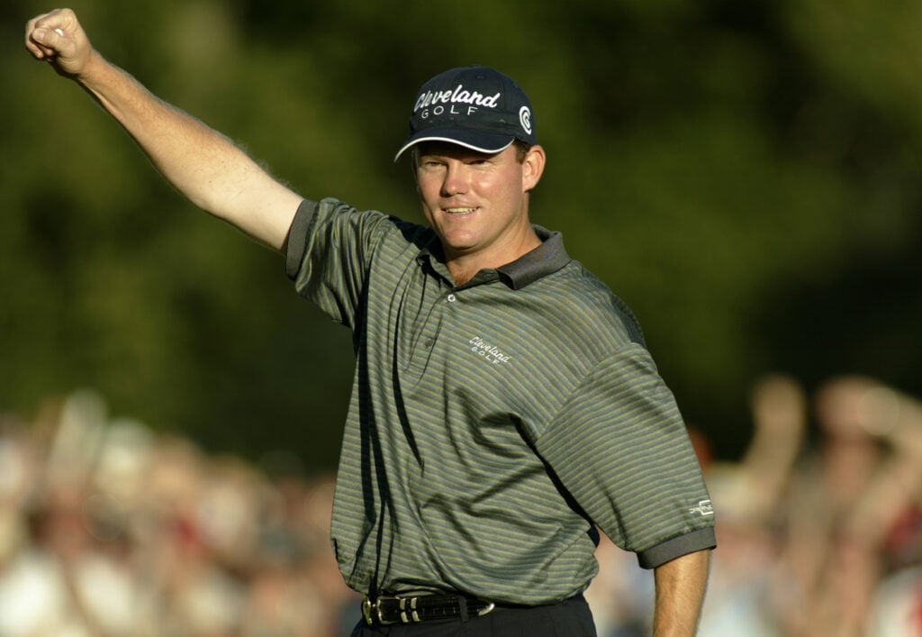 Shaun Micheel celebrates on the 18th green during the final round of the 85th PGA Championship at Oak Hill