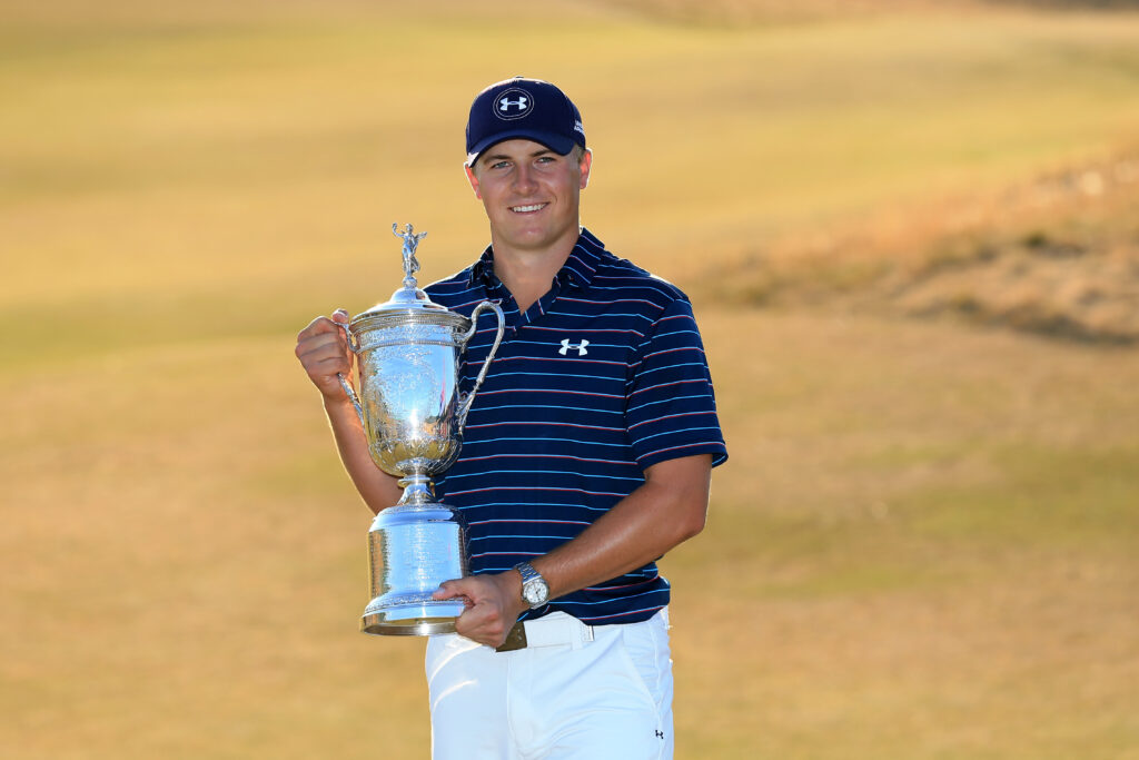 Jordan Spieth lifts the US Open trophy after winning at Chambers Bay in 2015