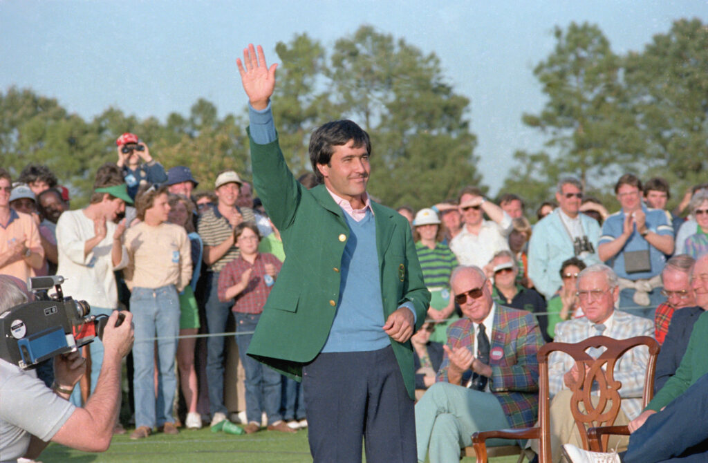 Seve Ballesteros presented with the green jacket after winning the 1983 Masters