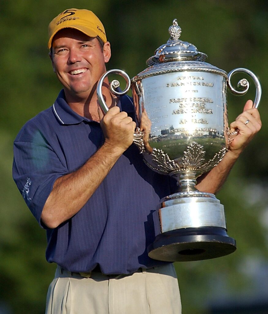 Rich Beem of the US holds the Wanamaker trophy at the 2002 PGA Championship
