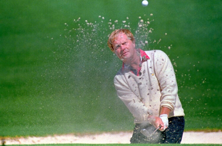 (Original Caption) Augusta, Ga.: Jack Nicklaus, who has won more Masters than anyone else with 6 victories, blasts out of a bunker to the 2nd green...