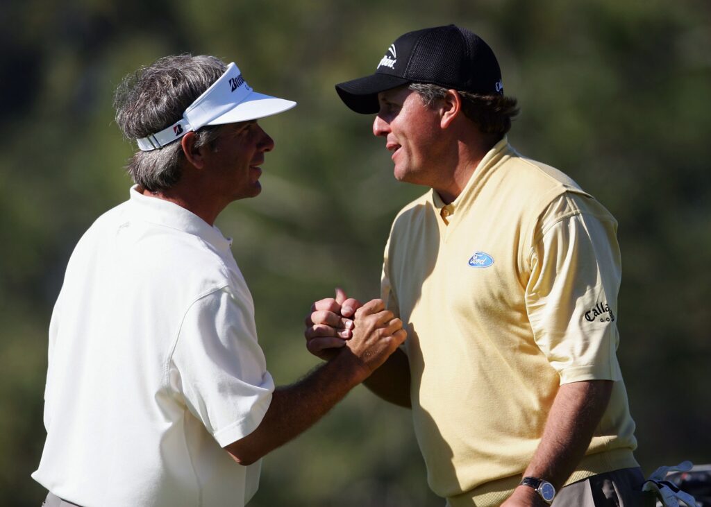Phil Mickelson and Fred Couples shake hands at the 2006 Buick Invitational