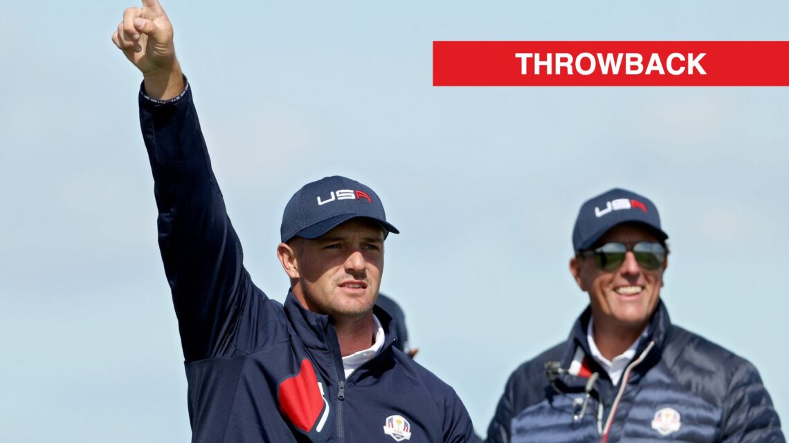 Phil Mickelson watches on after Bryson DeChambeau hits a tee shot at the 2021 Ryder Cup