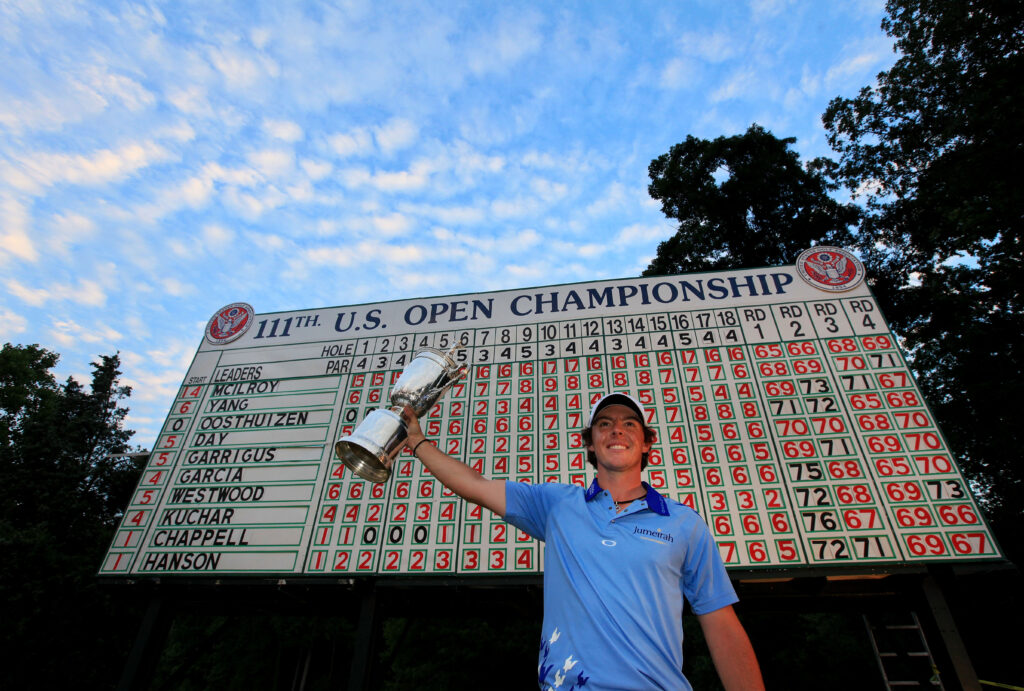 McIlroy of Northern Ireland poses with the trophy after winning the 2011 U.S. Open