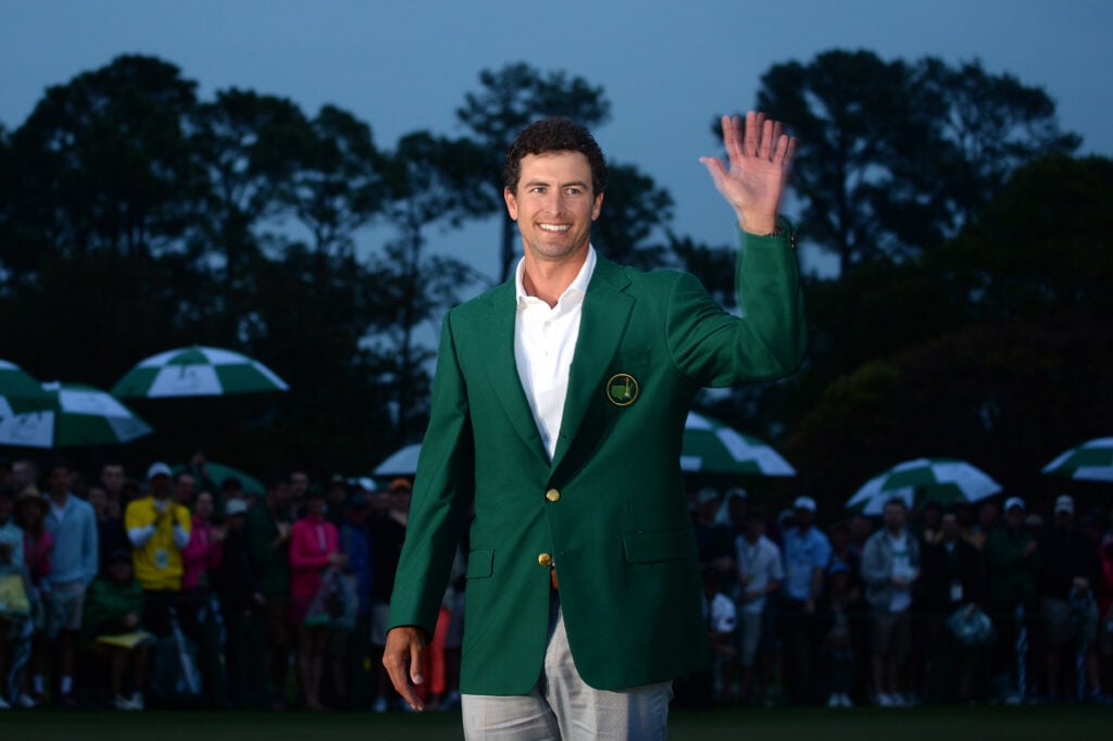 Adam Scott of Australia smiles while wearing his green jacket after winning the 2013 Masters