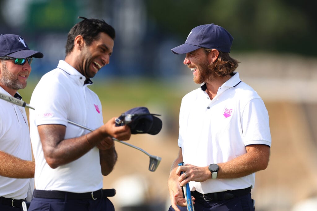 Aaron Rai and Tommy Fleetwood on the 18th green ahead of the Team Cup at Abu Dhabi Golf Resort