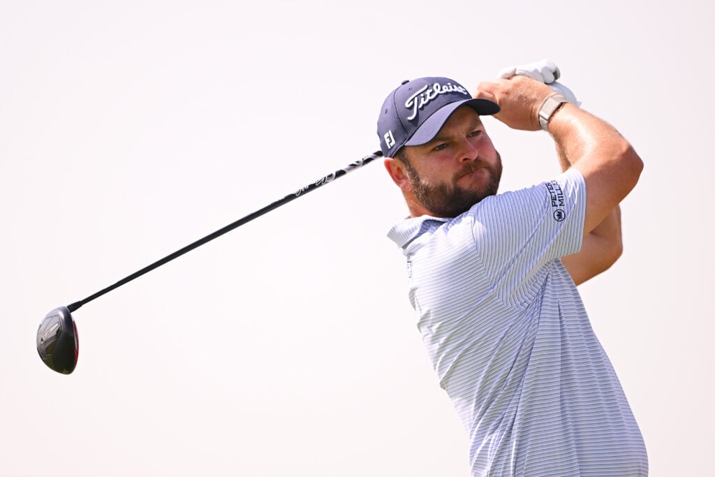 Jordan Smith hits a tee shot during the final round of the Abu Dhabi HSBC Championship