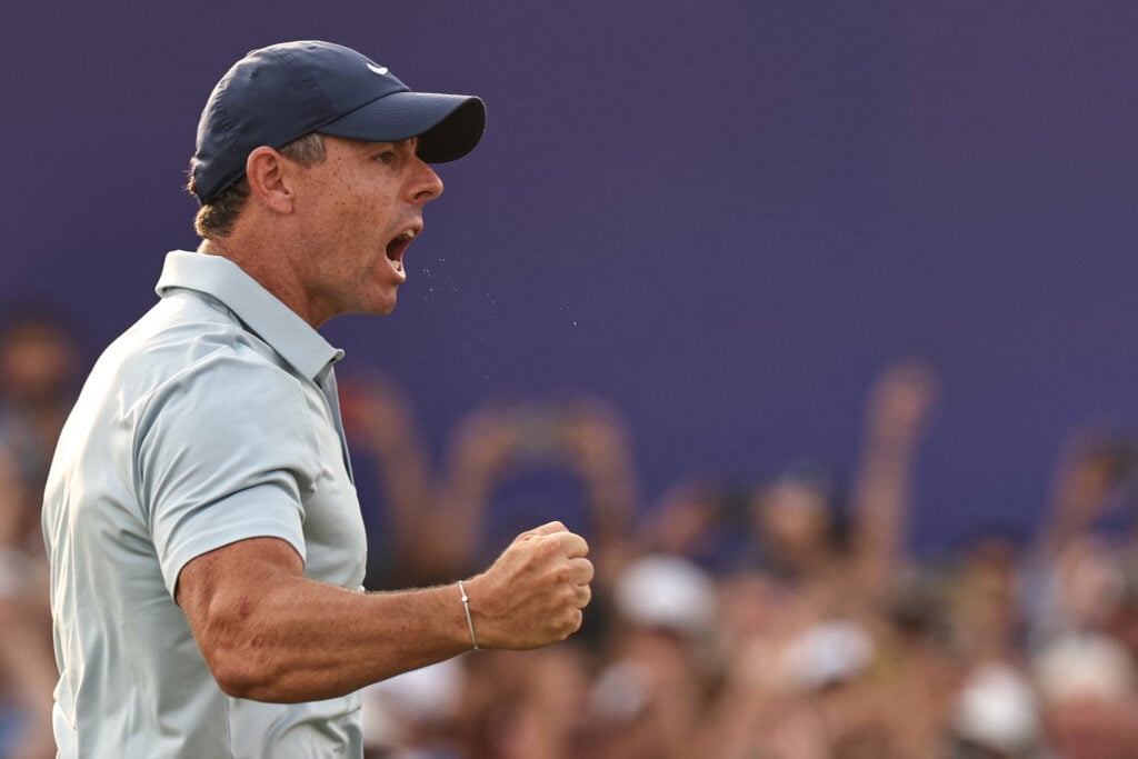 Rory McIlroy reacts after playing a shot on the eighteenth hole during the final day of the 2025 DP World Tour Championship