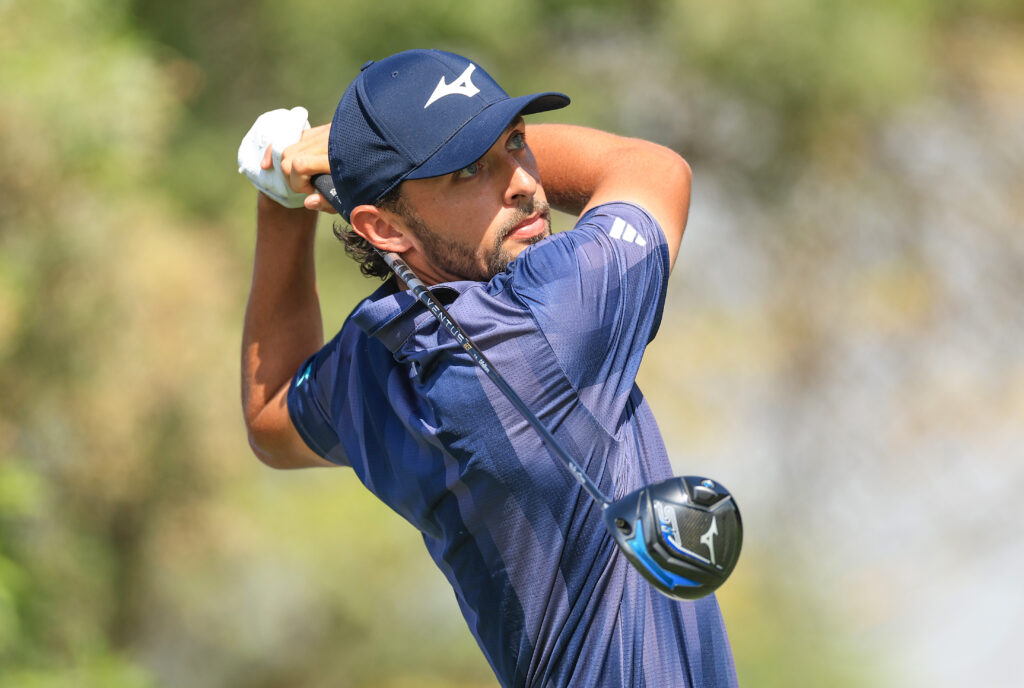 Marco Penge of England plays his tee shot on the second hole during the first round of the DP World Tour Championship 2025