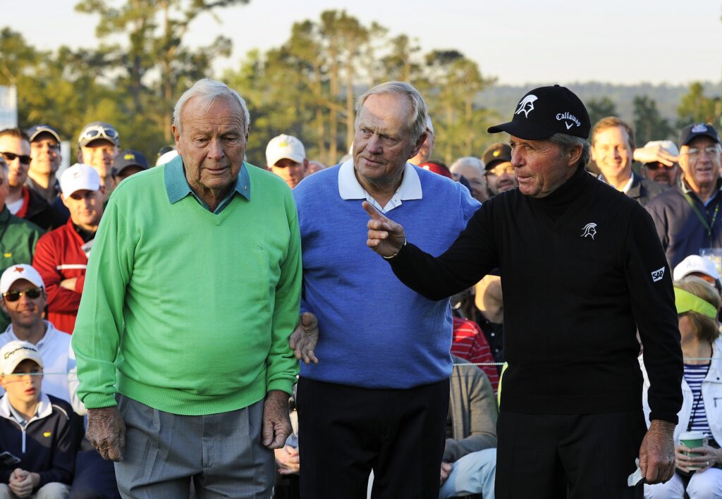 Arnold Palmer ,Jack Nicklaus and Gary Player leave after starting the 78th Masters at Augusta National Golf Club