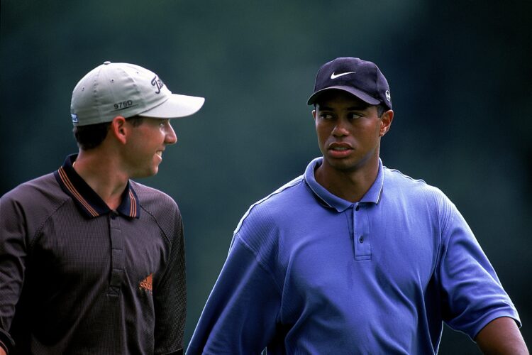 27 Aug 1999: Tiger Woods looks at Sergio Garcia who smiles at him during the World Golf Challenge - NEC Invitational at the Firestone Country Club ...