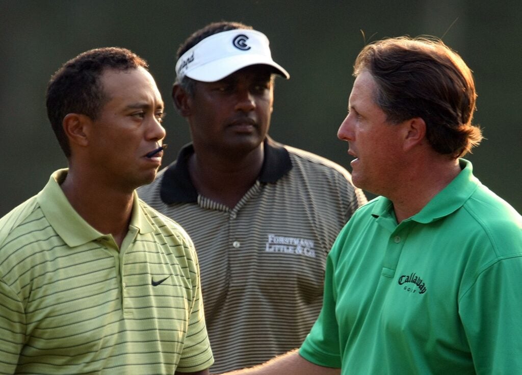 Tiger Woods, Vijay Singh and Phil Mickelson after the first round of the Deutsche Bank Championship at TPC Boston