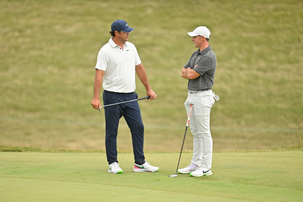 Rory McIlroy and Brooks Koepka speaks during the first round of the 2023 US Open