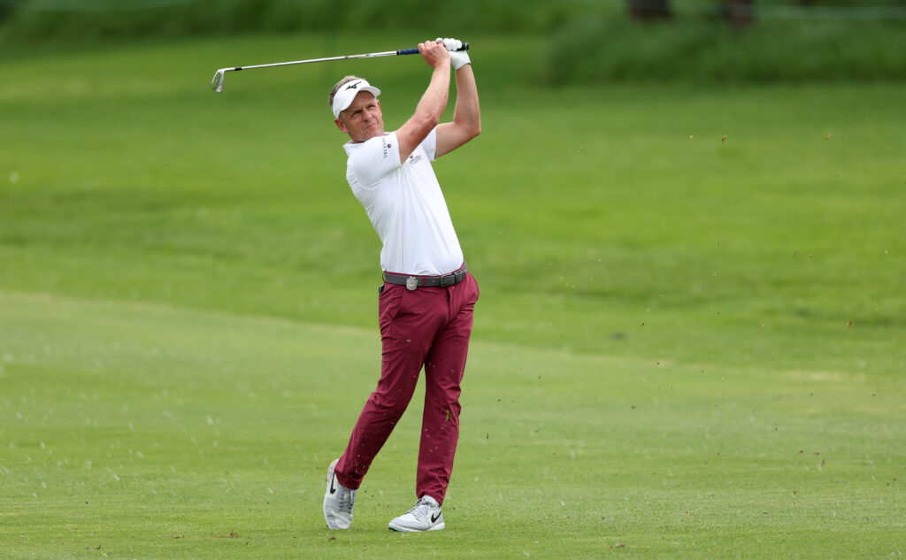 Luke Donald hits an approach shot during the third round of the Nedbank Golf Challenge