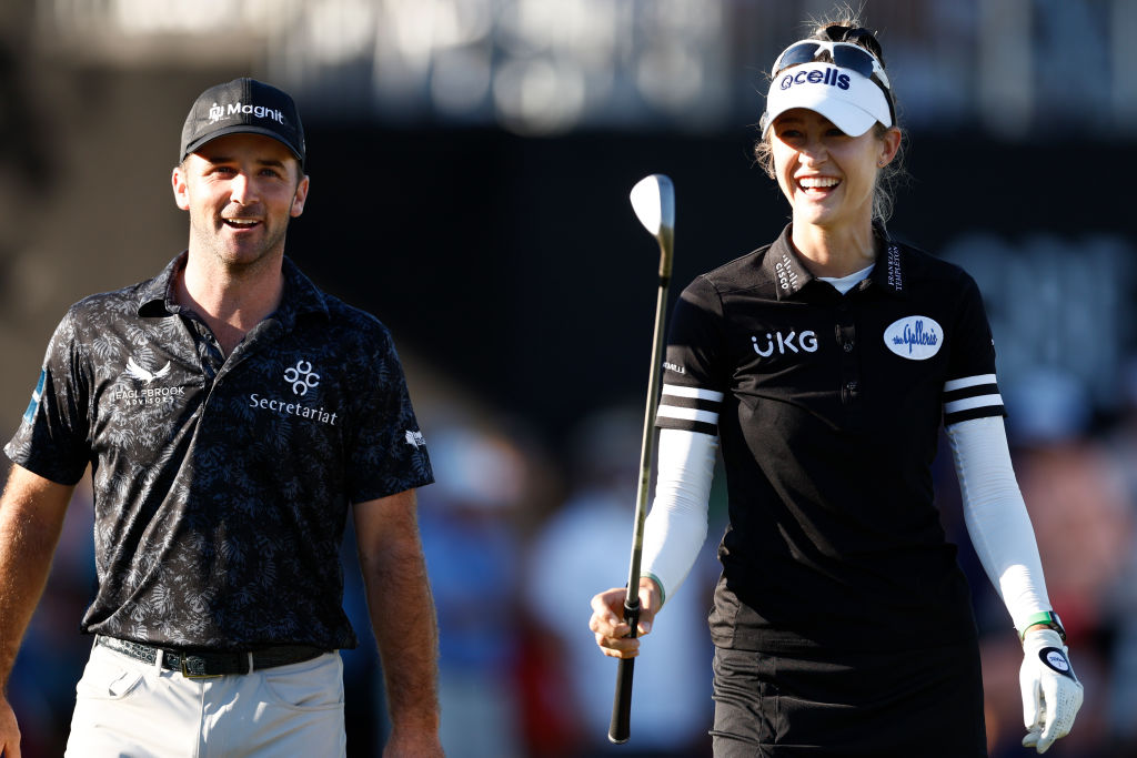 Denny McCarthy and Nelly Korda of the United States react on the 18th green during round two of the QBE Shootout at Tiburon Golf Club