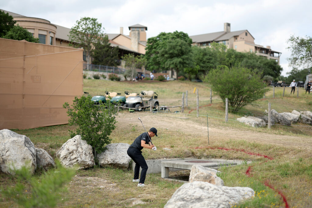 Jordan Spieth of the United States plays a ball on the 18th hole during the third round of the Valero Texas Open