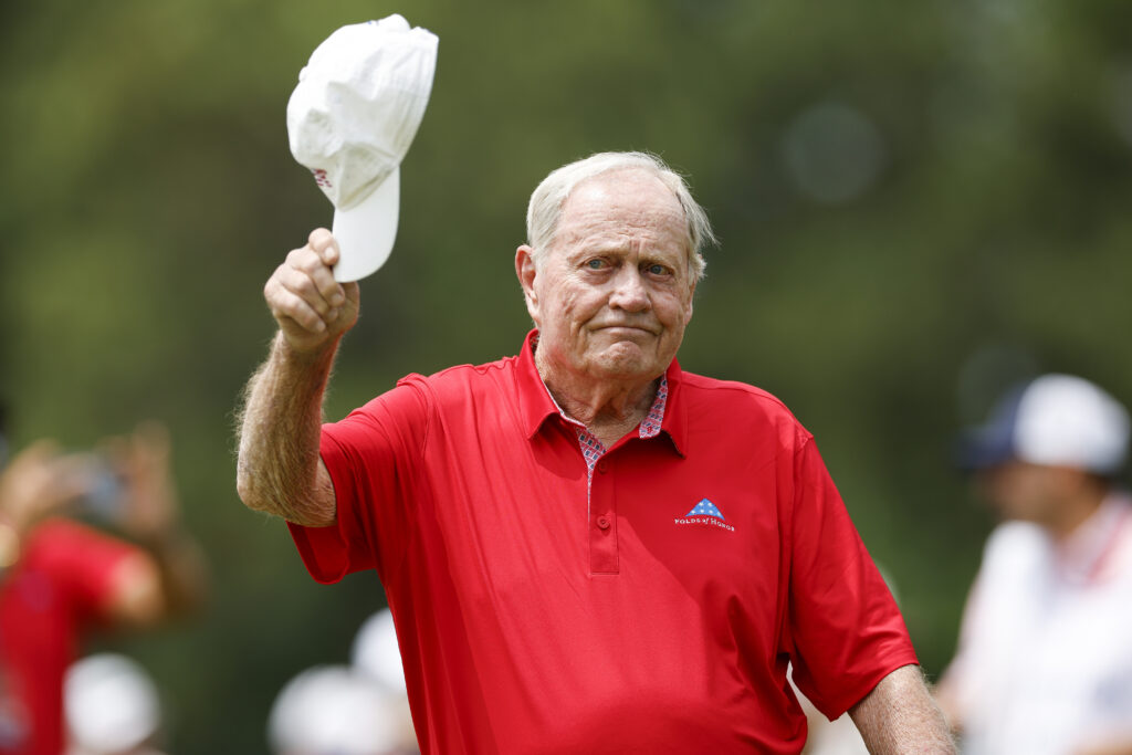 Jack Nicklaus of the United States tips his cap on the 18th hole as he participates in the Folds of Honor Greats of Golf
