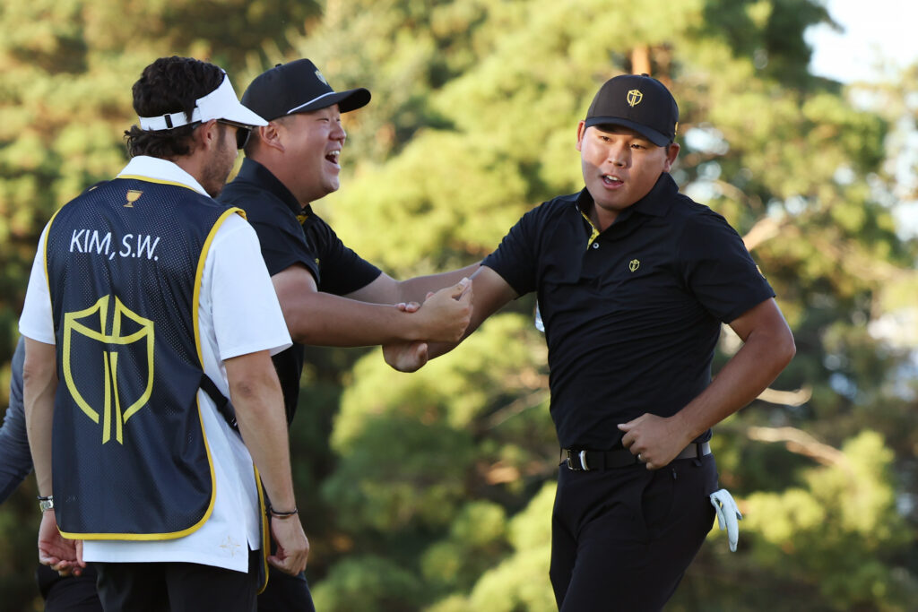 Si-woo Kim and Sungjae Im celebrate during the second day of the 2024 Presidents Cup