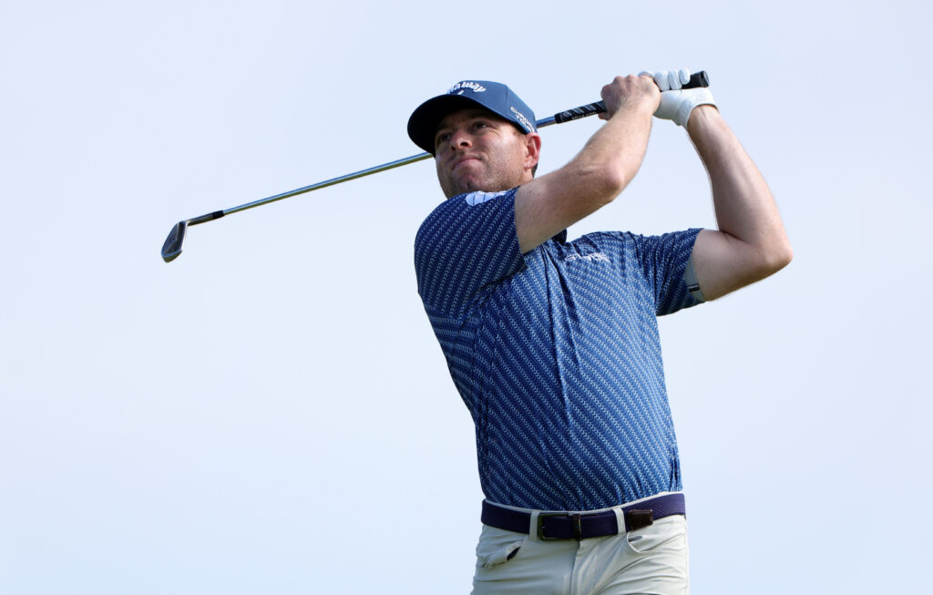 Max Greyserman hits a tee shot during a practice round ahead of The Open Championship