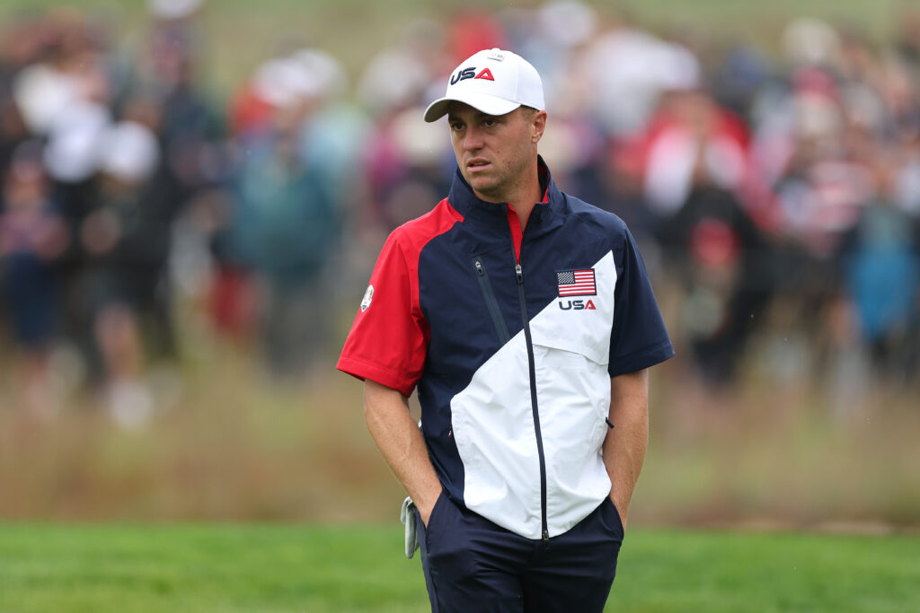 Justin Thomas looks on during a practice round ahead of the Ryder Cup