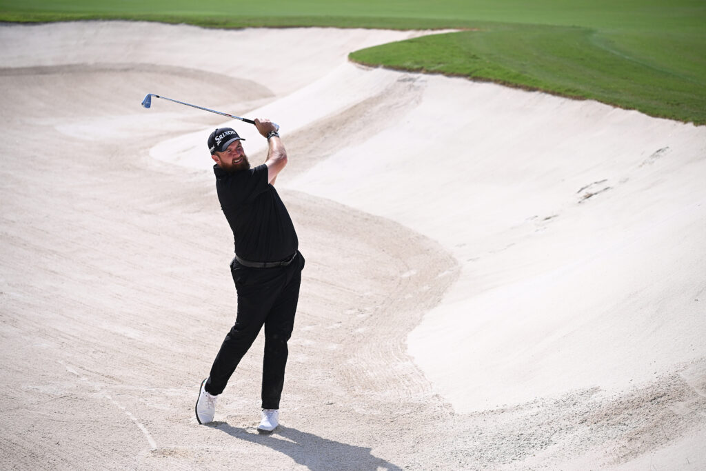 Shane Lowry hits a ball out of the bunker during the final round of the DP World Tour Championship
