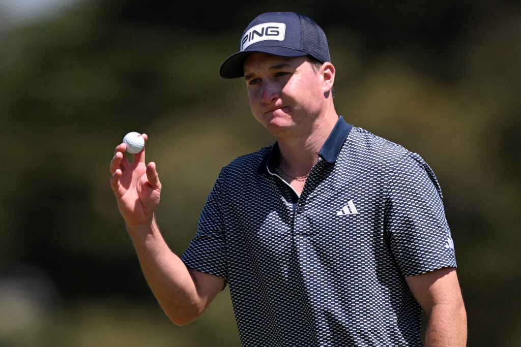 Matt McCarty acknowledges the crowd during the final round of the Australian Open