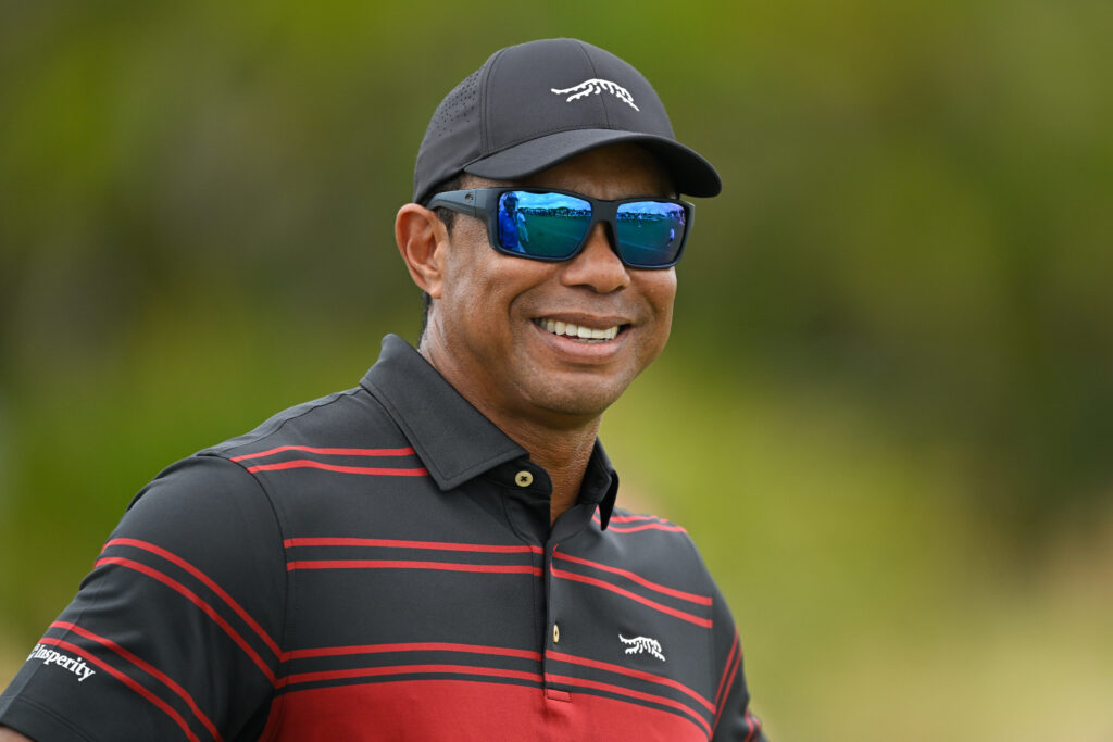 Tiger Woods smiles during the final round of the Hero World Challenge at Albany Golf Course