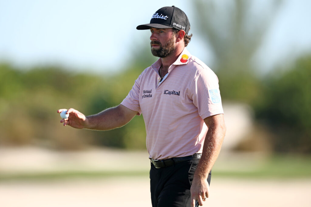 Cameron Young of the United States reacts to his putt on the 17th green during the second round of the Hero World Challenge