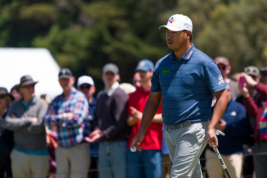 Si Woo Kim of Korea looks on from the 2nd green on day four of the Crown Australian Open 2025