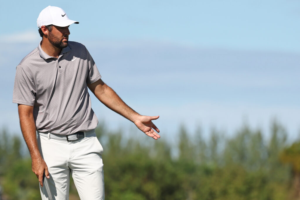 Scottie Scheffler reacts to a putt during the final round of the Hero World Challenge