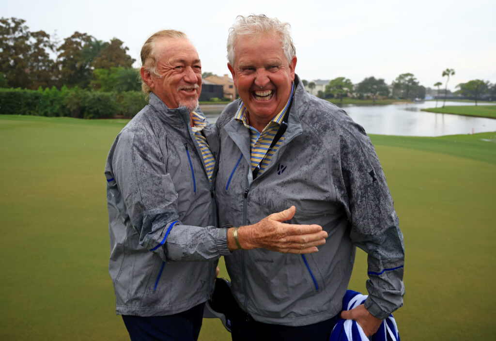 Miguel Angel Jimenez and Colin Montgomerie of Team Europe celebrate winning the Skechers World Champions Cup