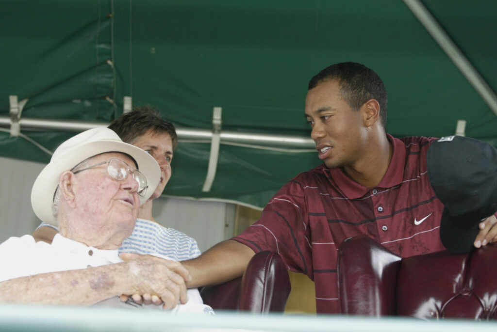 Tiger Woods shakes hands with Byron Nelson during the 2002 Verizon Byron Nelson Classic