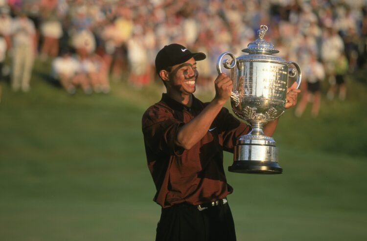 20 Aug 2000:  Tiger Woods holds up his trophy after winning the PGA Championship, part of the PGA Tour at the Valhalla Golf Club in Louisville, Ken...