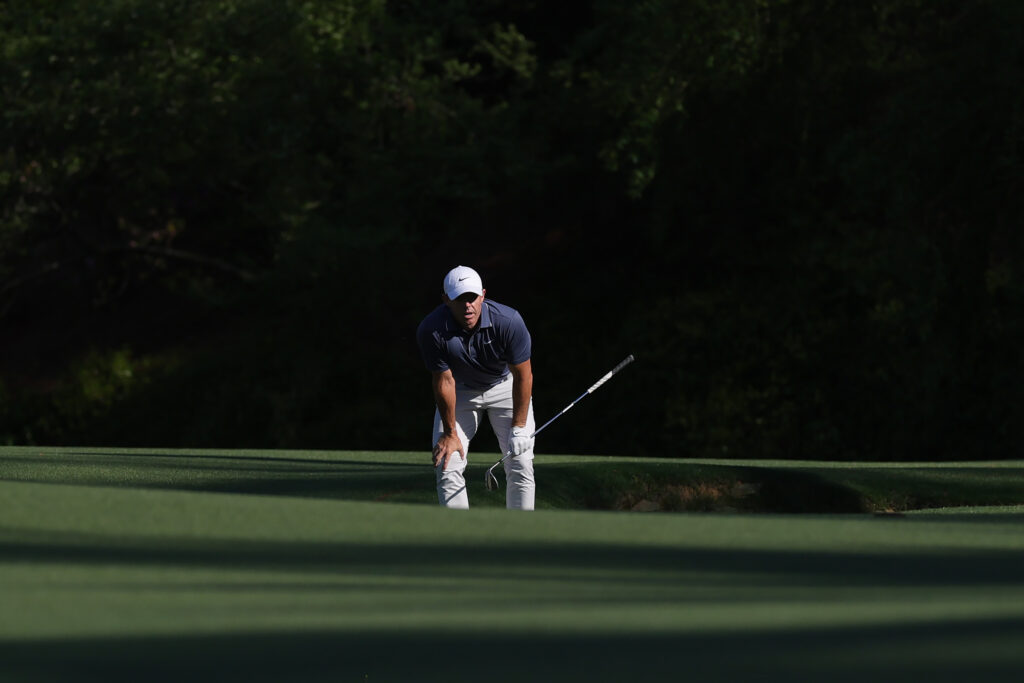 Rory McIlroy of Northern Ireland reacts after his third shot on the 13th hole during the final round of the 2025 Masters Tournament at Augusta National Golf Club