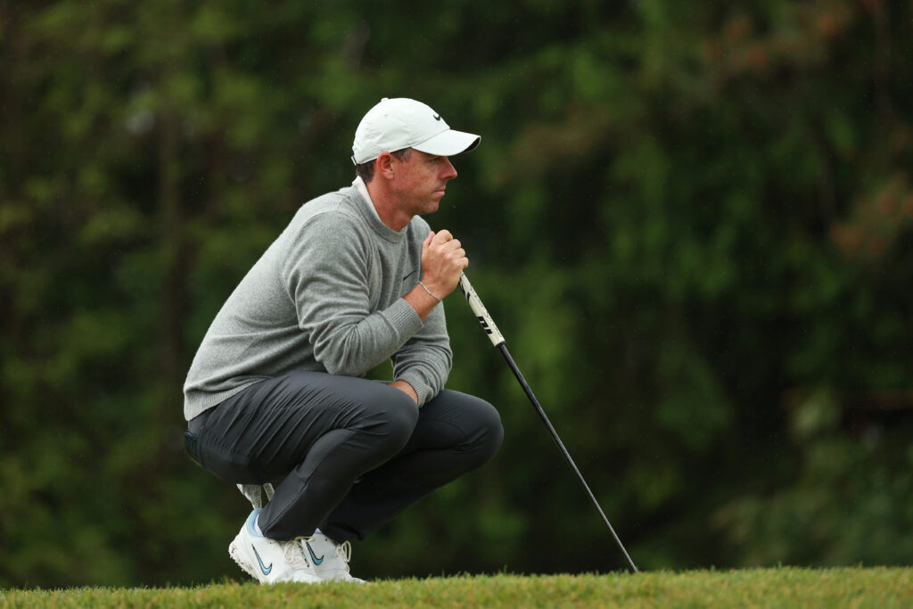 Rory McIlroy lines up a putt during the first round of the RBC Canadian Open