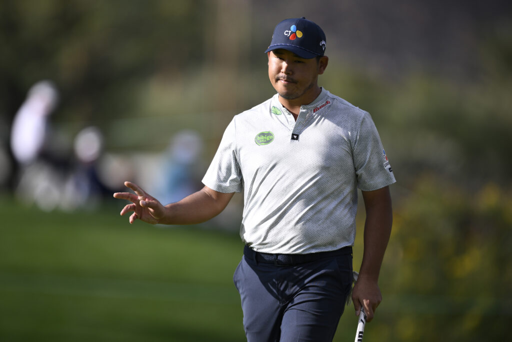 Si-woo Kim acknowledges the crowd during the third round of The American Express